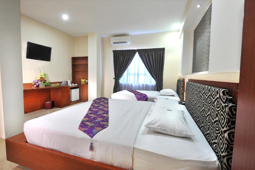 Gaja Hotel Pekanbaru Phòng bức ảnh